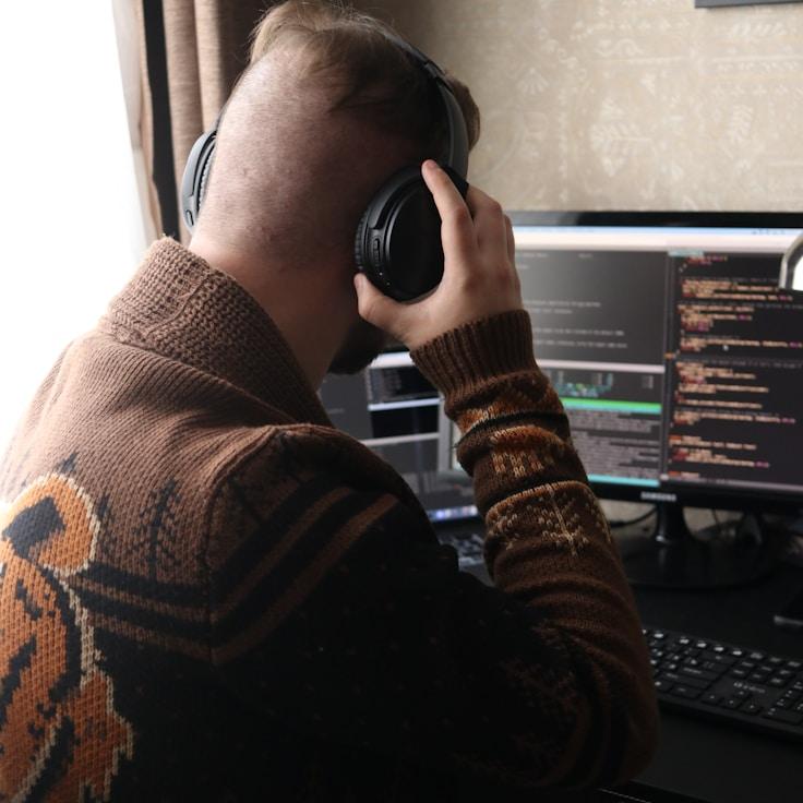 Mobile app project planning workspace with devices and development tools